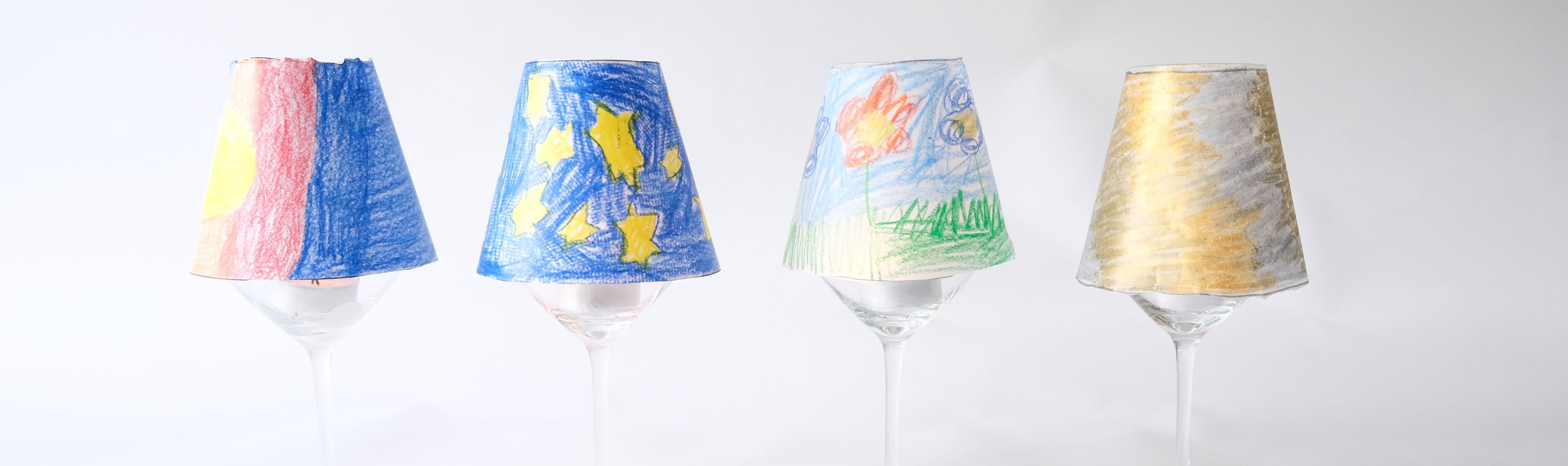 Windlicht – vier selbstgebastelte Windlichter aus Weingläsern