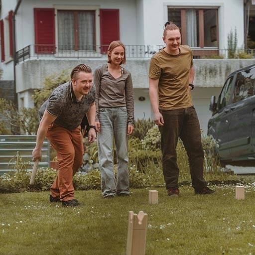 Life situations - A couple holding a ball stands arm in arm