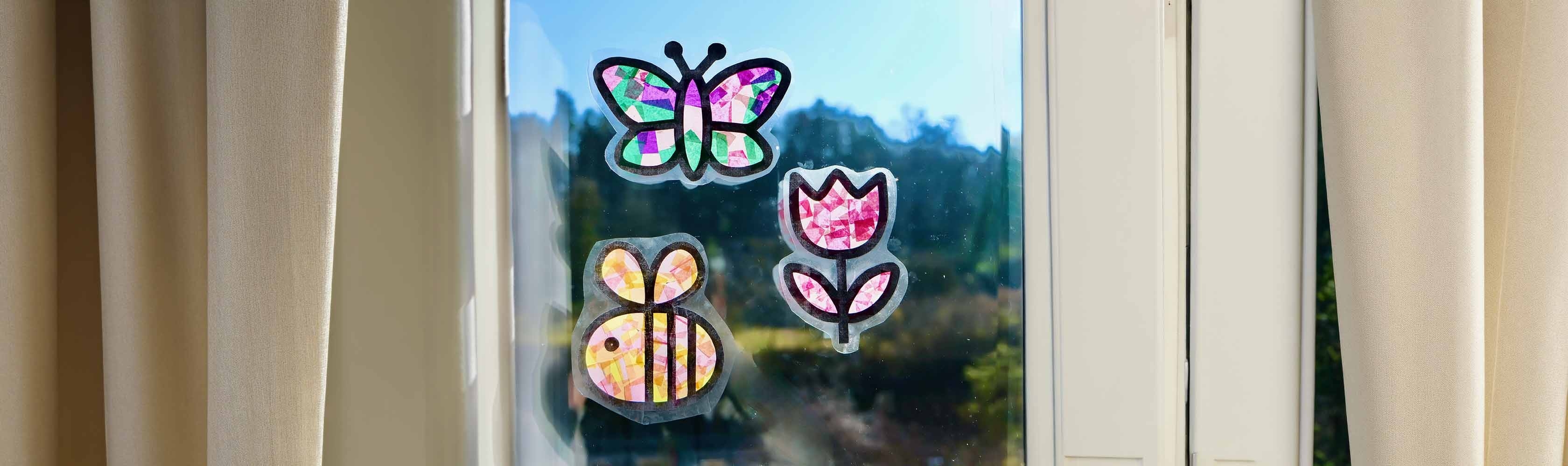Suncatcher: farbige selbstgemachte Fensterbilder